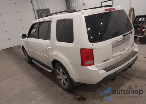 2014 Honda Pilot Touring z USA, uszkodzony, nr VIN 5FNYF4H94EB004511